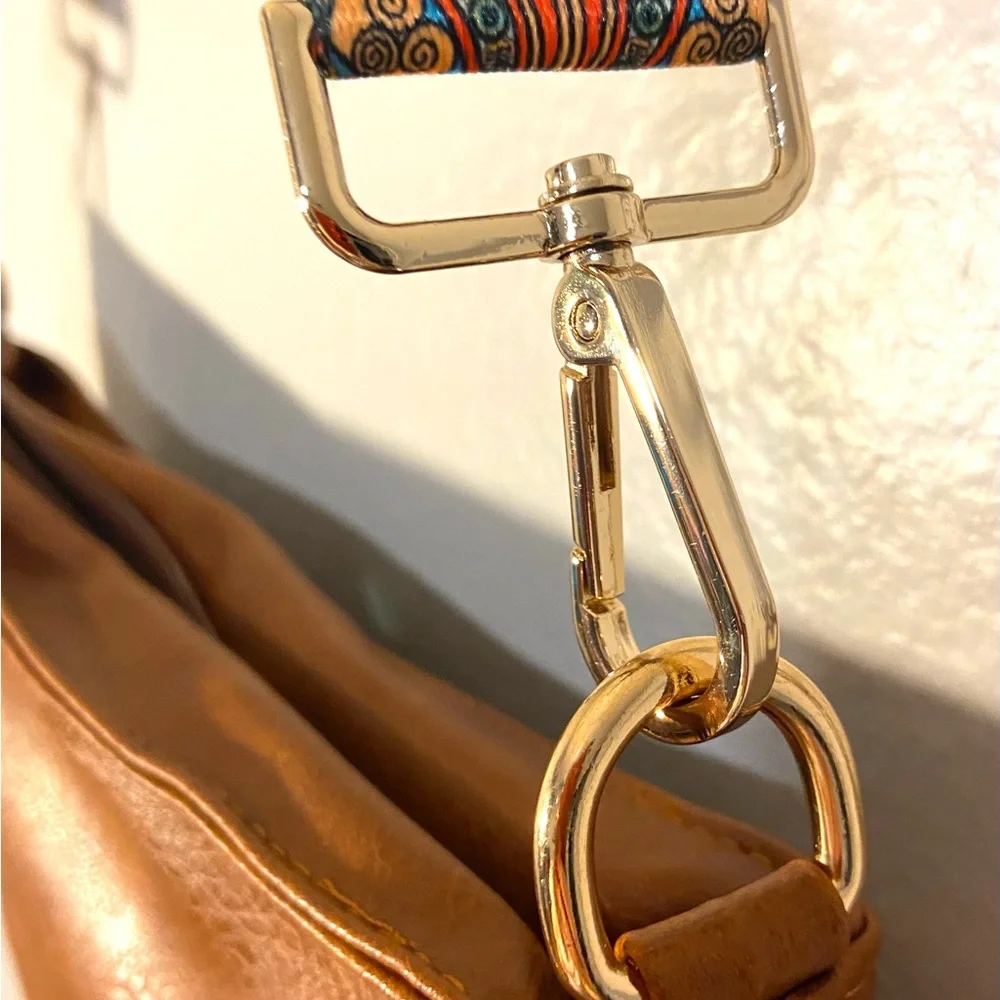 NWOT Hobo bag. Natural brown with colorful fabric adjustable strap.
